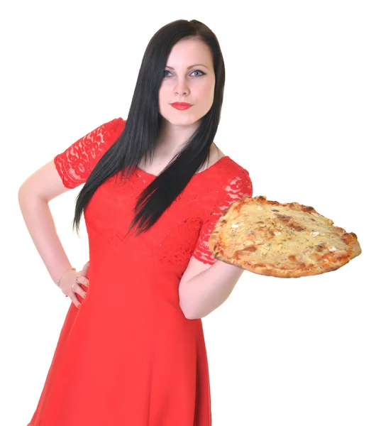 Kvinna anläggning pizza — Stockfoto