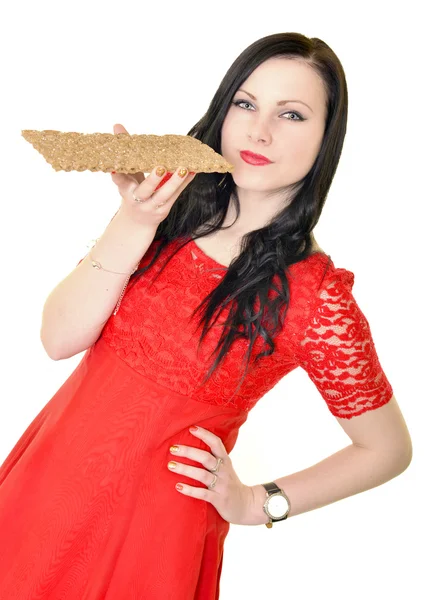 Mulher comendo pão crocante — Fotografia de Stock