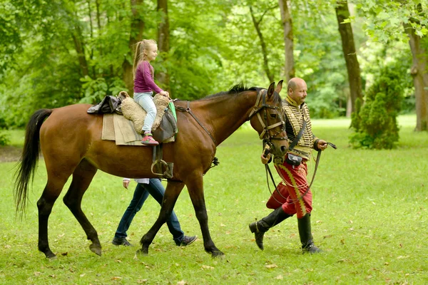 Girl on her white horse — Stock Photo, Image