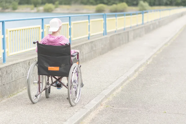 Woman in wheelchair — Stock Photo, Image