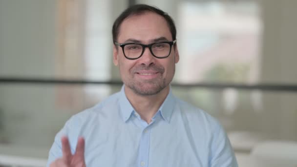 Portrait of Positive Middle Aged Man showing Victory Sign — Stock Video