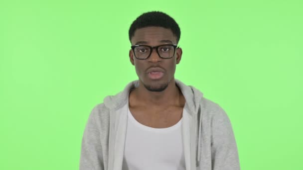 Shocked African Man on Green Background — Stok Video