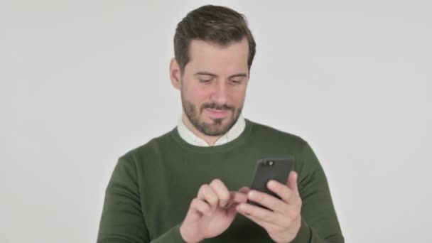 Portrait of Man using Smartphone, White Screen — стоковое видео