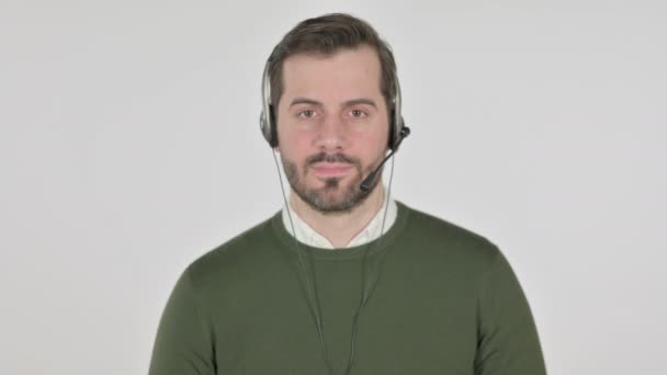 Portrait of Man with Head Set Smiling at Camera, White Screen — Stock video