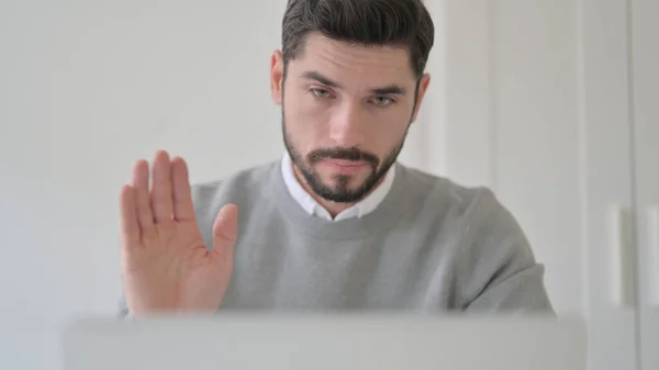 Close up of Young Man Waving hand for Video Call on Laptop — Stock fotografie