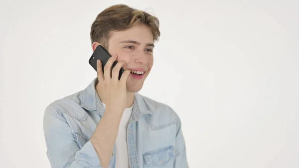 Jovem falando no telefone em fundo branco — Fotografia de Stock