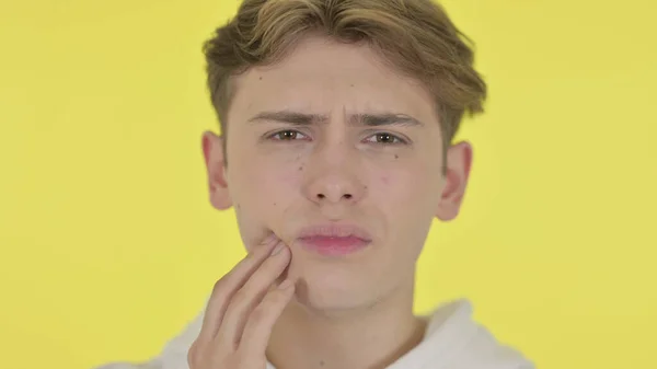 Close Up of Young Man with Toothache, Yellow Background — Stok Foto