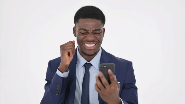( 영어 ) African Businessman Loss on Smartphone on White Background — 스톡 사진