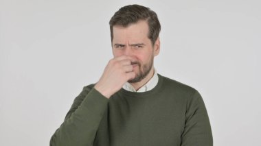 Portrait of Man Smelling Bad Odor, White Screen