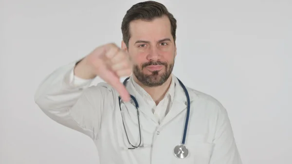 Portrait of Doctor showing Thumbs Down, White Screen — Stock Fotó