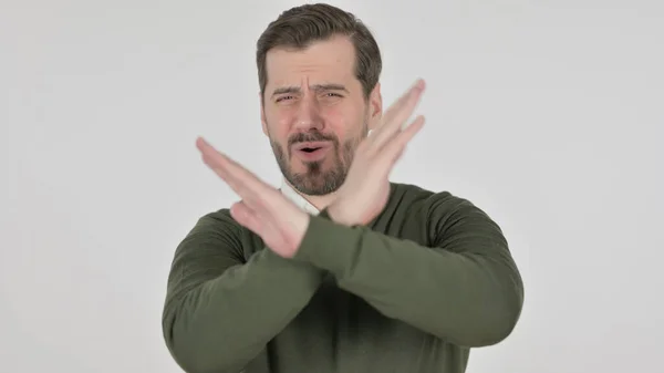 Portrait of Man Showing No by Arm Gesture, White Screen — Stockfoto