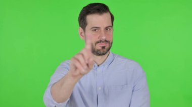 Portrait of Man Showing No by Finger, Denial, Green Screen