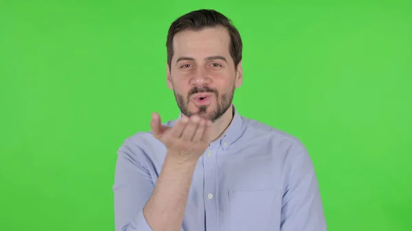 Portrait of Man Giving Flying Kiss, Green Screen — 스톡 사진