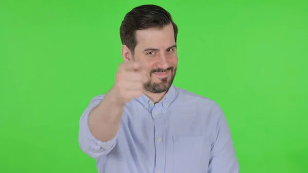 Portrait of Man Pointing at the Camera, Green Screen — стоковое фото