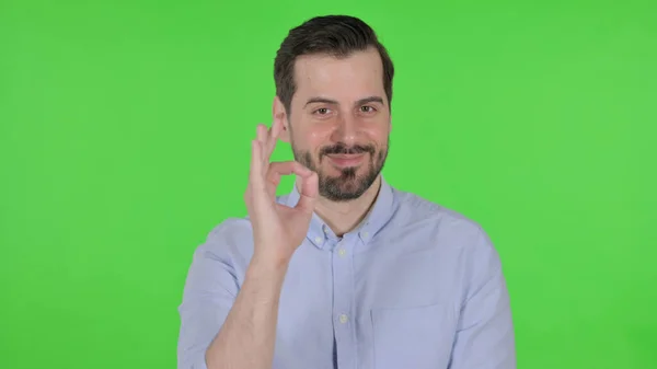 Portrait of Man showing Ok with Finger, Green Screen — стоковое фото