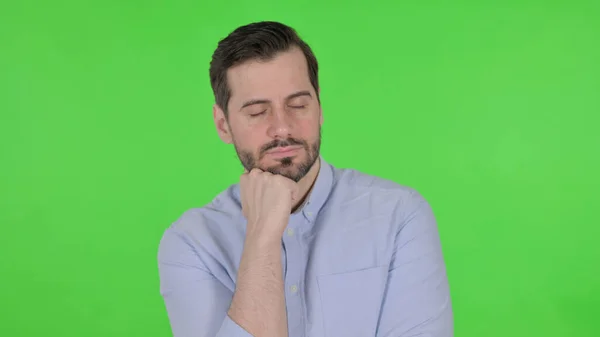 Portrait of Sleepy Man taking Nap, Green Screen — Fotografia de Stock