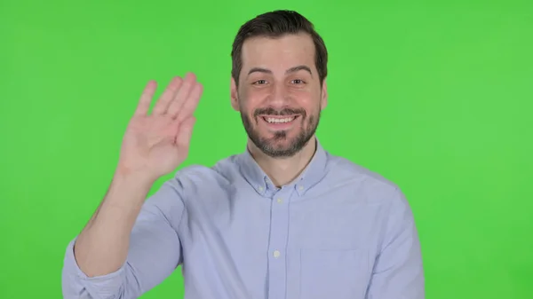 Portrait of Man Saying Hello, Green Screen — Photo
