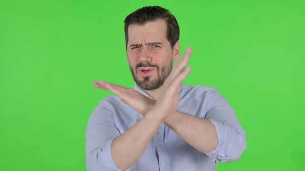 Portrait of Rejecting Man with Arm Gesture, Green Screen — Stok fotoğraf