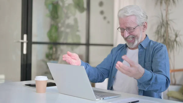Successful Senior Old Man Celebrating on Laptop in Office