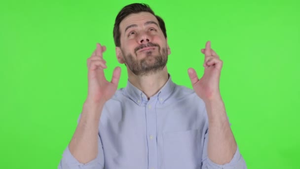 Portrait of Man Praying with Fingers Crossed, Green Screen — Stockvideo