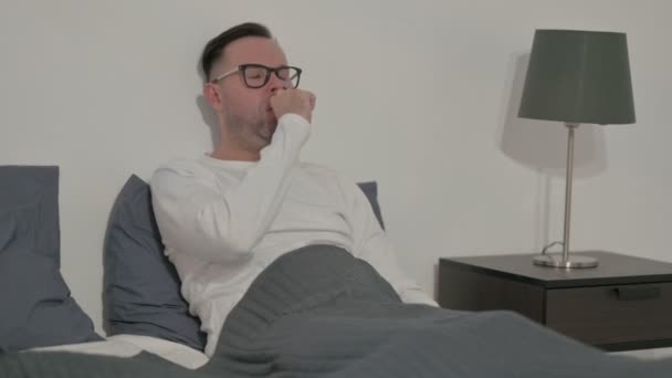 Middle Aged Man Coughing While Sitting Bed — Vídeo de Stock