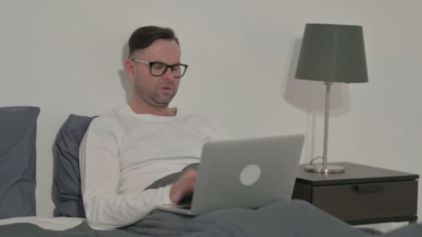 Middle Aged Man Having Neck Pain While Using Laptop Bed — Vídeos de Stock