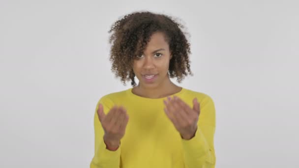 African Woman Pointing Camera White Background — Video