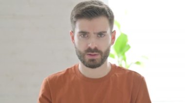 Aggressive Creative Young Man Fighting in Anger, Abusing