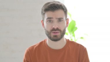 Denying Creative Young Man Rejecting with Crossed Arm Gesture