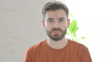 Rejecting Creative Young Man Shaking Head in Denial