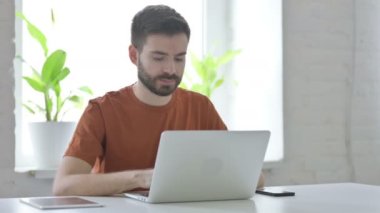 Rejecting Gesture by Creative Young Man at Work