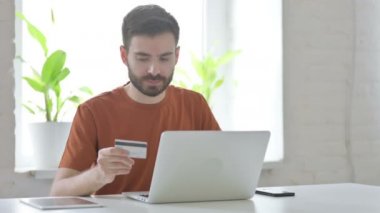 Creative Young Man Having Online Payment Problem on Laptop