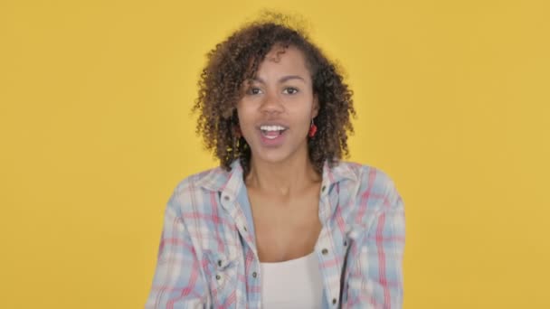 Successful African Woman Celebrating Yellow Background — Vídeo de Stock