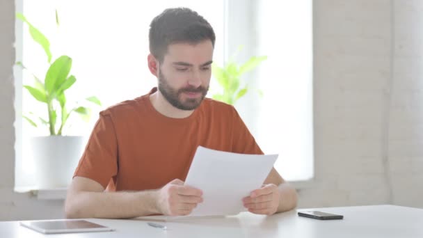 Upset Creative Young Man Reacting Loss Documents — Stock Video