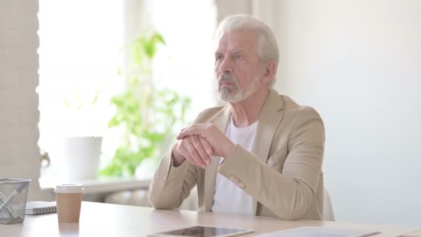 Pensive Senior Old Man Thinking While Sitting Office — Stockvideo