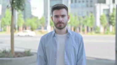 Disagree Man Shaking Head in Denial Outdoor