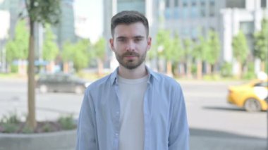 Man Clapping in Appreciation Outdoor