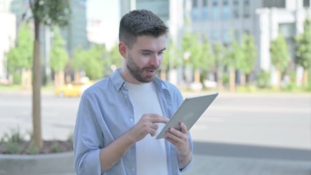 Man Celebrating Online Win Tablet Outdoor — Video