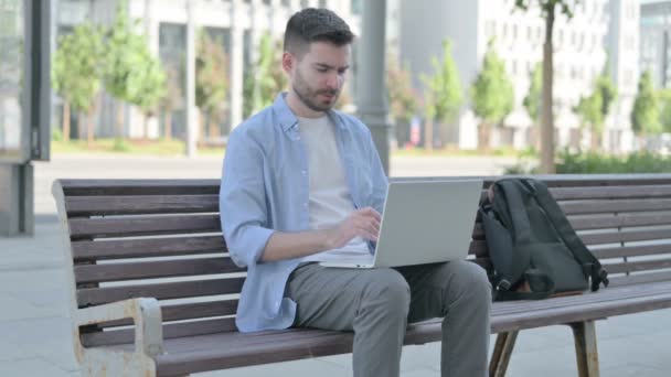 Man Wrist Pain Using Laptop While Sitting Bench — Stock Video