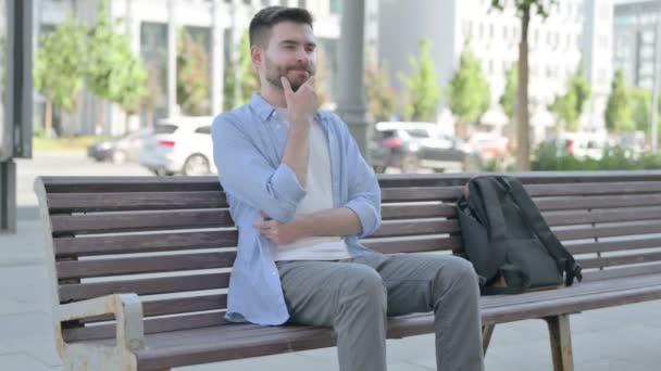 Pensive Man Thinking While Sitting Bench — Vídeos de Stock