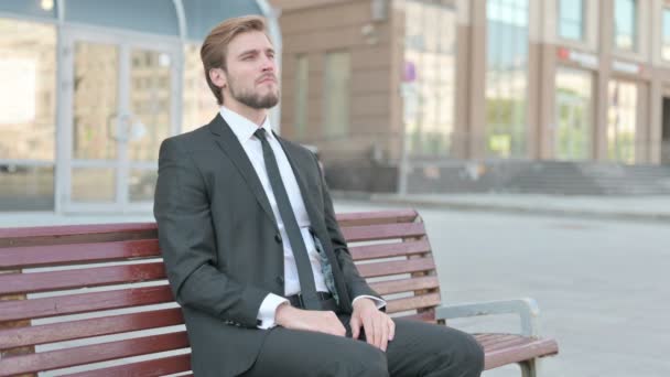 Middle Aged Businessman Having Back Pain While Sitting Bench Outdoor — Vídeo de stock