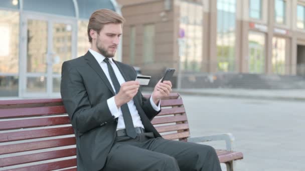 Middle Aged Businessman Reacting Loss Smartphone Sitting Outdoor Bench — Stok Video