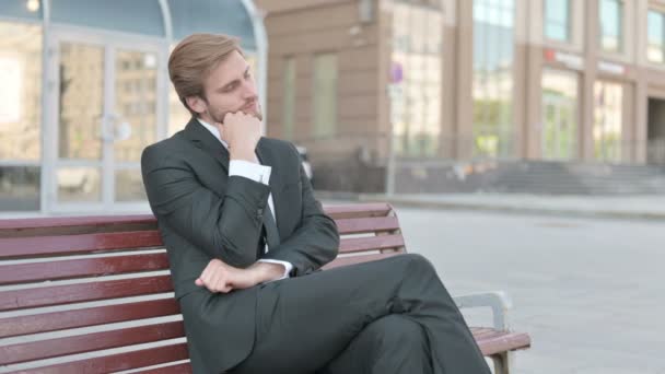 Tired Middle Aged Businessman Sleeping While Sitting Outdoor Bench — ストック動画