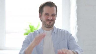 Portrait of Mature Man Showing No Sign Arms Crossed 