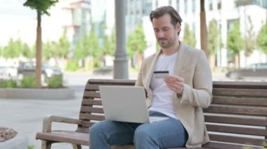 Man Having Online Payment Problem via Smartphone, Outdoor