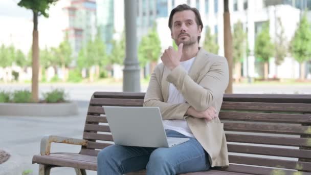 Thinking Man Using Laptop While Sitting Bench — Stockvideo