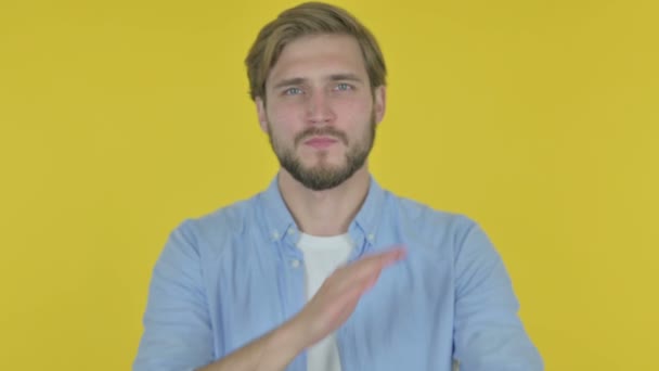 Rejecting Casual Young Man Arm Gesture Yellow Background — Vídeos de Stock