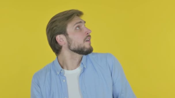 Casual Young Man Feeling Scared Frightened Yellow Background — Stock video