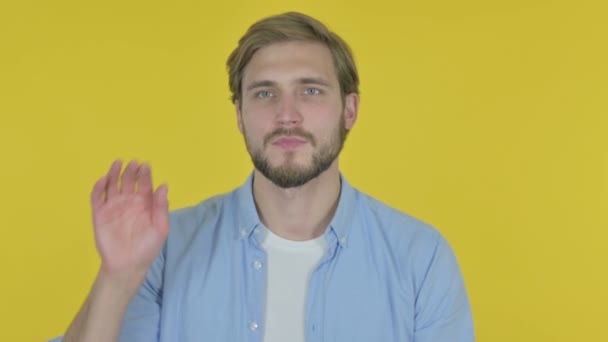 Casual Young Man Trying Listen Secret Yellow Screen — Stock video