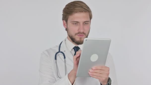 Young Adult Doctor Using Digital Tablet White Background — Stockvideo